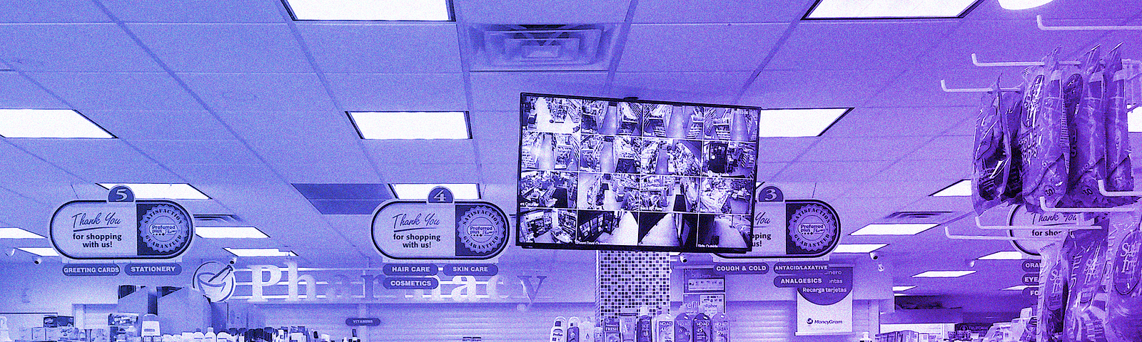 Purple-filtered image of the inside of a pharmacy store. There is a TV with surviellance footage in the middle.