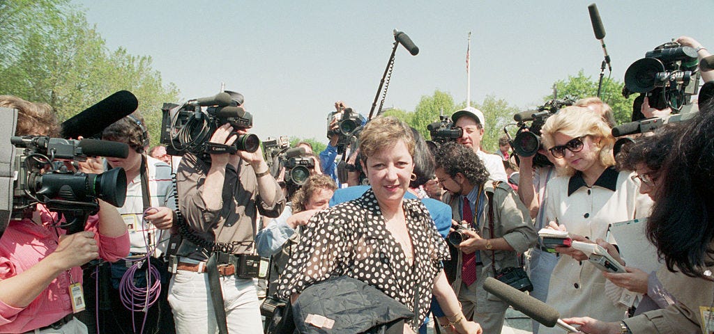 Photo shows McCorvey in front of Supreme Court steps talking to the press in 1989.