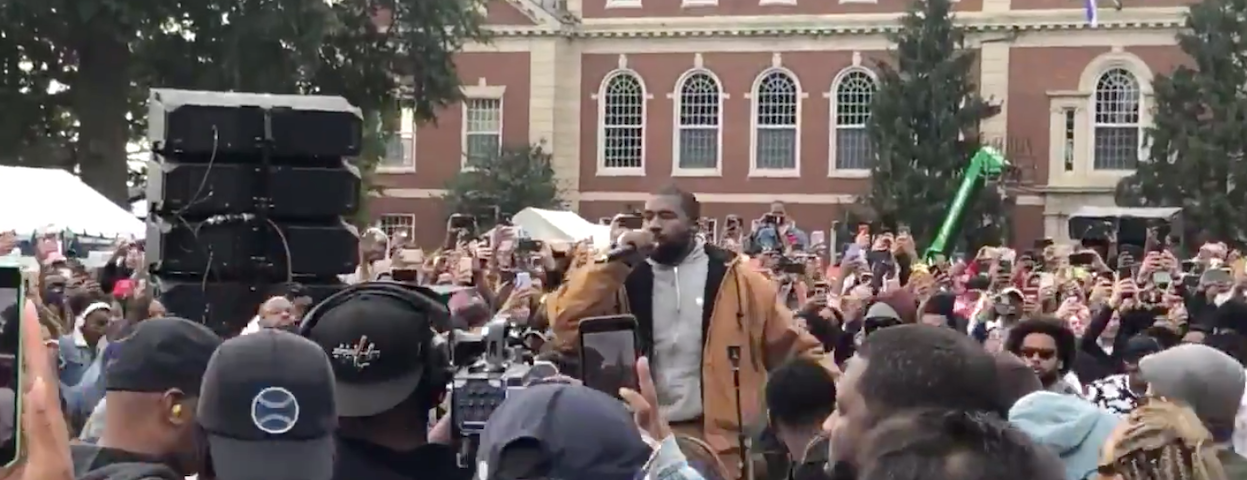 A photo of Kanye performing his Sunday Service at Howard University.