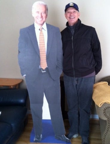 A cardboardcutout of President Biden with the author Robert Pacilio