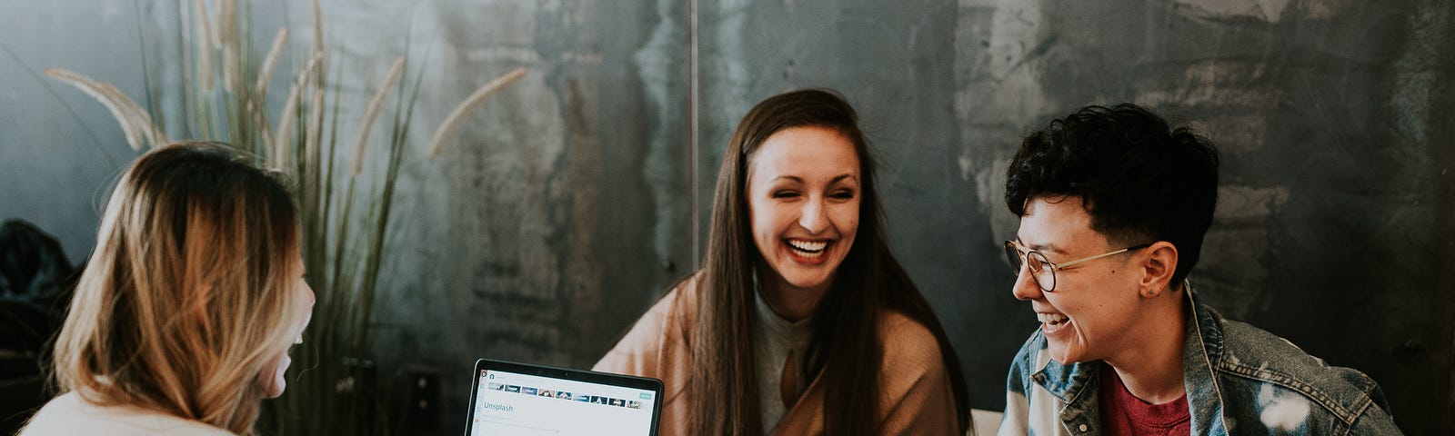 Pix of a group of girls using computers to communicate with the rest of the world.