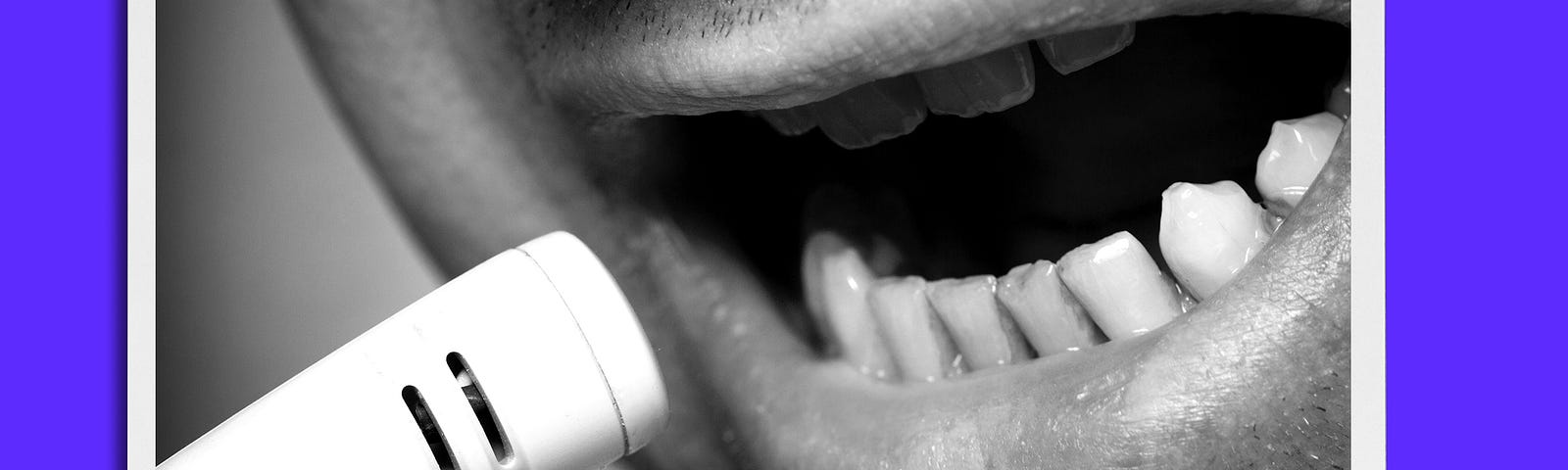 Purple, black, and white photo illustration of a close-up of a man’s mouth speaking into a mic.