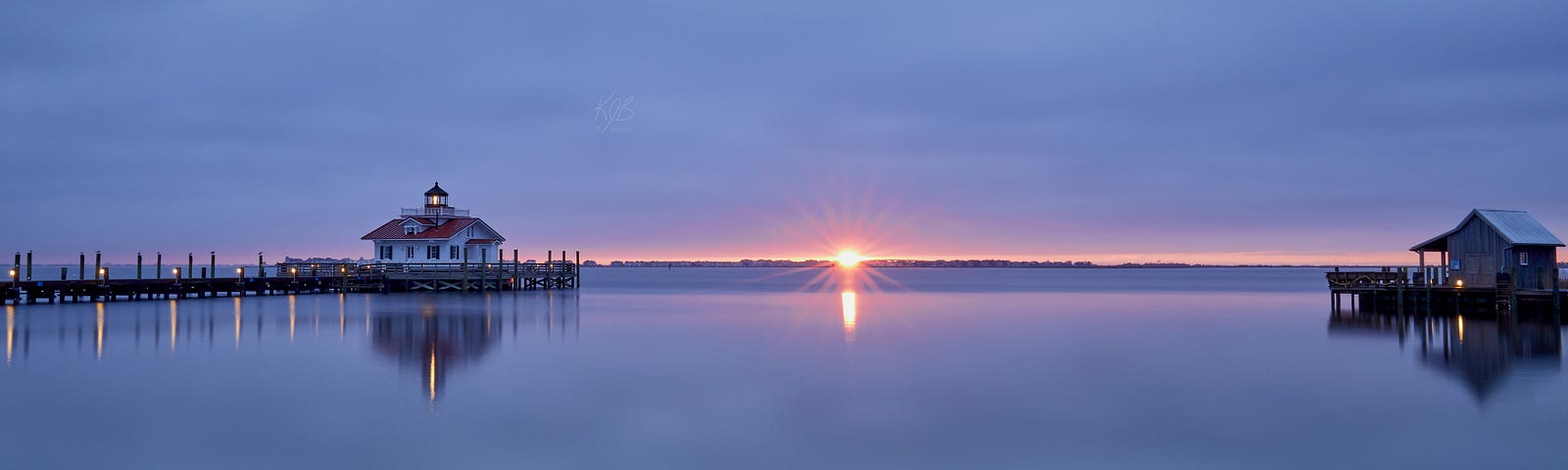 Sun rises with dazzle over Manteo lighthouse
