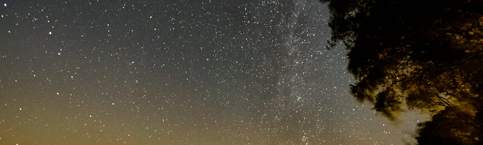Night sky over Lake Ontario: stars, Milky Way, and Canadian skyglow