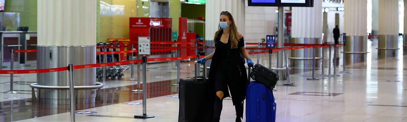 A passenger walks at Dubai International Airport in April 2020.