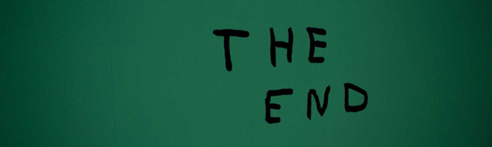 A green background with the text saying “the end”