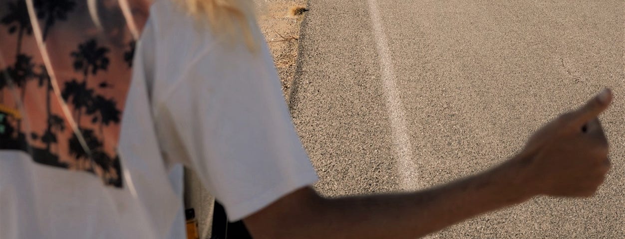 Woman hitchhiking