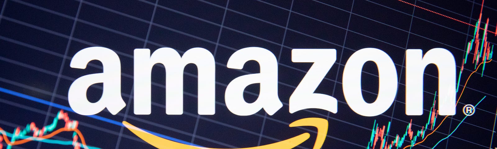 Multiple exposure photo of the Amazon logo juxtaposed over a generic stock chart.