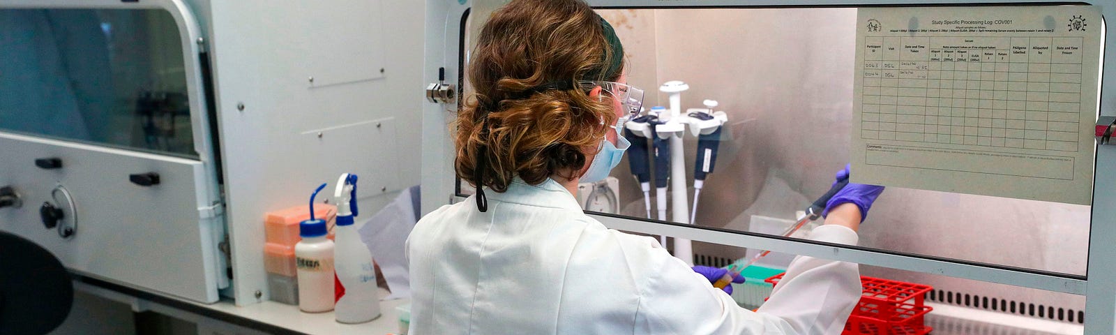 A scientist working at the Oxford Vaccine Group’s laboratory facility at the Churchill Hospital in Oxford.