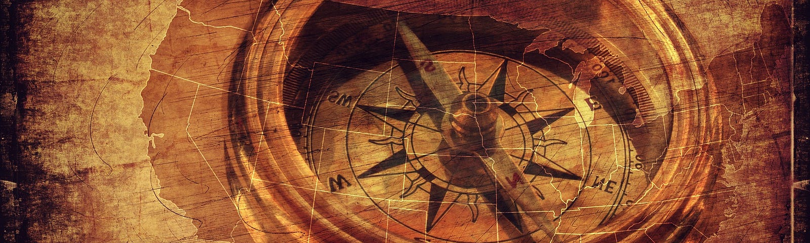 an old compass on a textured dark background