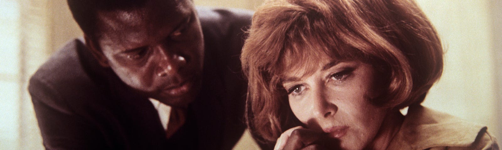 Sidney Poitier comforting a distraught Lee Grant in a scene of In the Heat of the Night