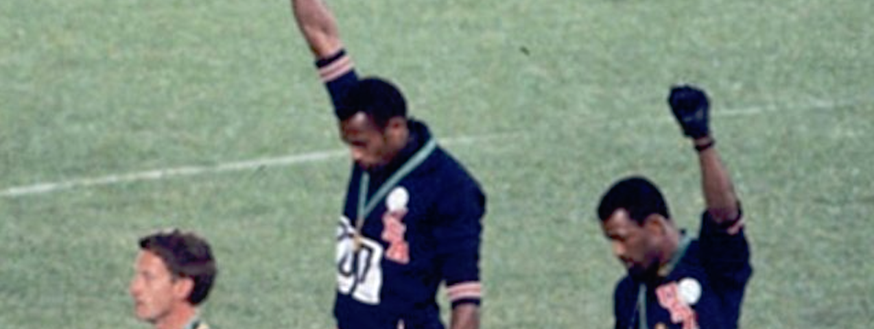 Tommie Smith and John Carlos give the Black Power salute in 1968. Peter Norman at left.