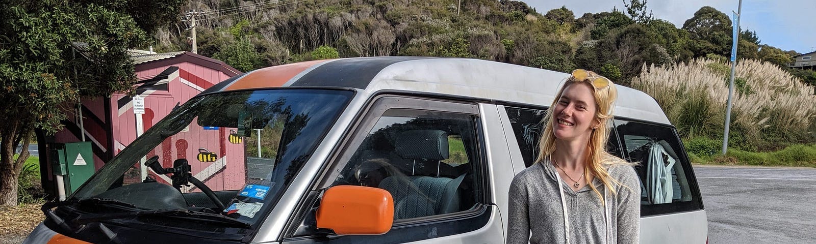 Lauren Poulson outside of her van.