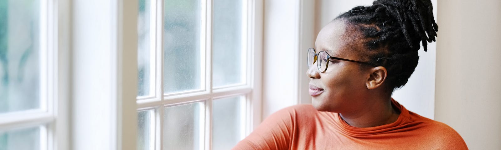 Woman looking out the window.