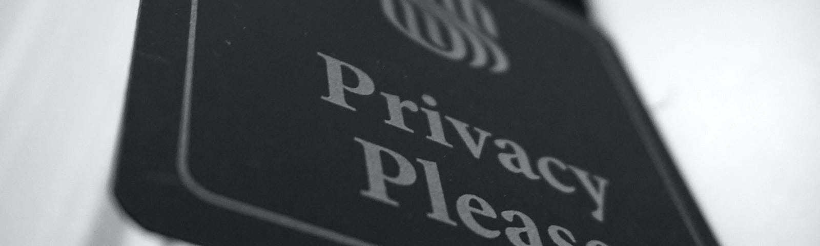 sign saying “privacy please”