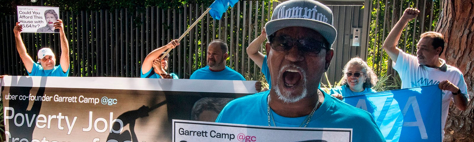 Uber and Lyft drivers demonstrate outside the $72 million home of Uber co-founder Garrett Camp to protest unfair wages.