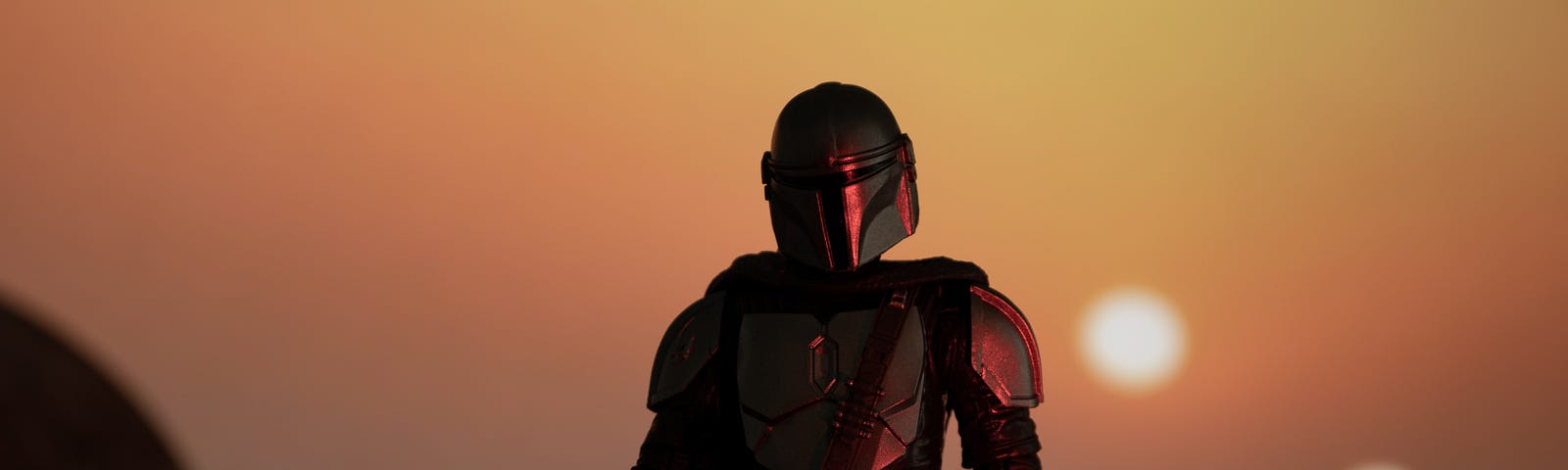 A picture of the Mandalorian in the sunset
