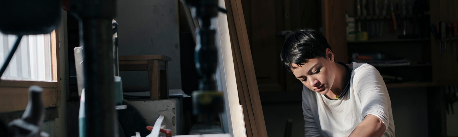 Woman doing carpentry work.