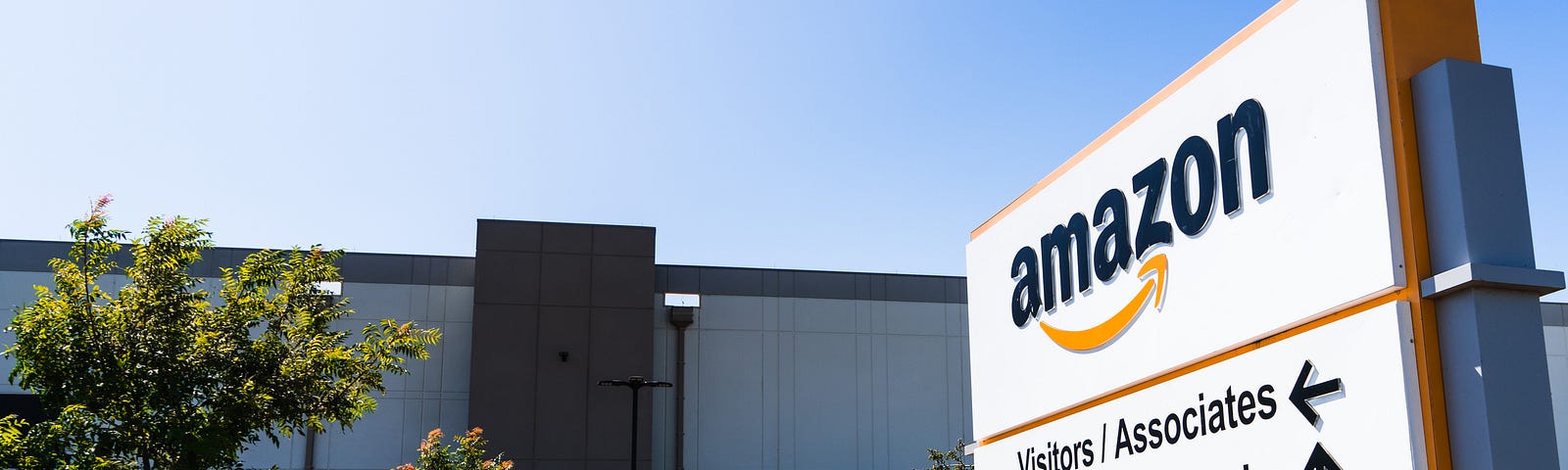 An Amazon Fulfillment Center sign and building located in Sacramento, CA.