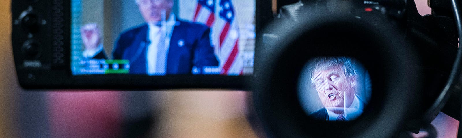 Donald Trump is seen speaking through a camera at a press conference.