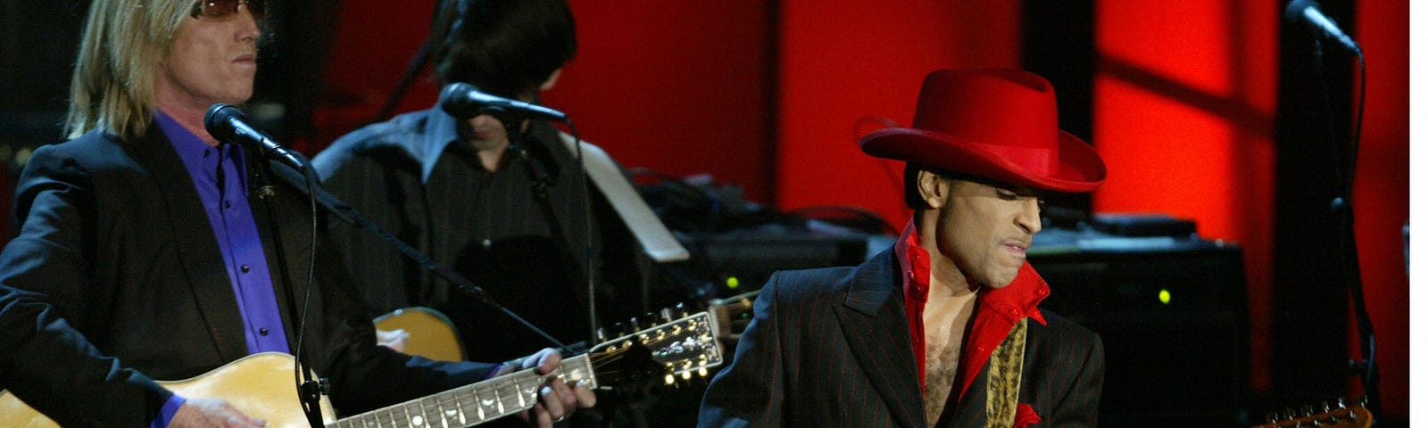 Prince performs along with Tom Petty at the 19th Annual Rock and Roll Hall of Fame Induction Ceremony in New York City, 2004.