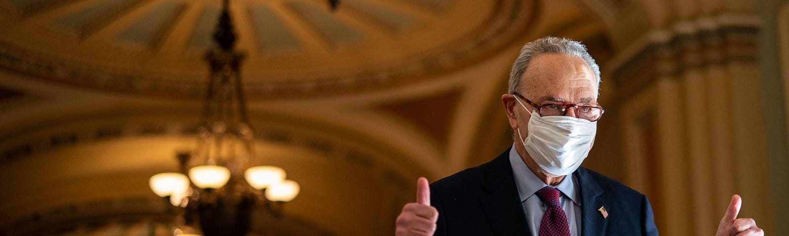 Chuck Schumer gives a thumbs up