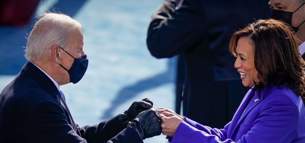 President Biden fist bumping Vice President Harris.