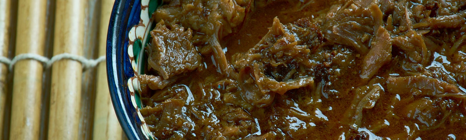 A bowl of Dinuguan, a Filipino stew made from pork and pig’s blood.