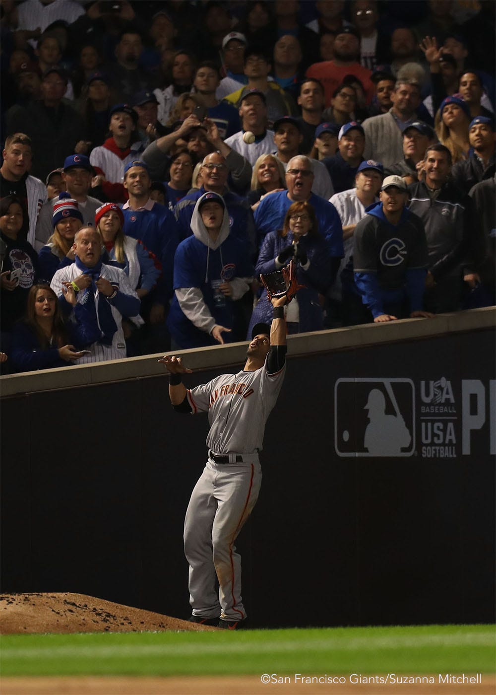 Angel Pagan catches a foul ball hit by Anthony Rizzo in the second inning.