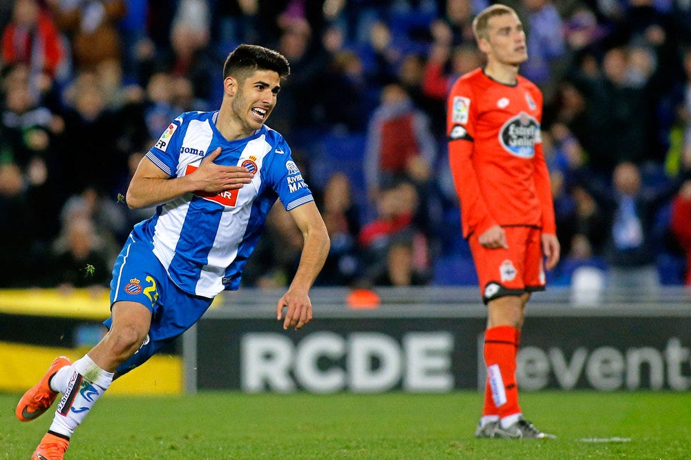 Marco Asensio scoring against Deportivo La Coruna.