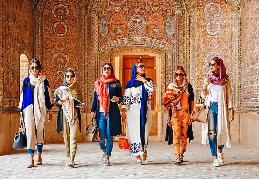 A group of female tourist walking together.