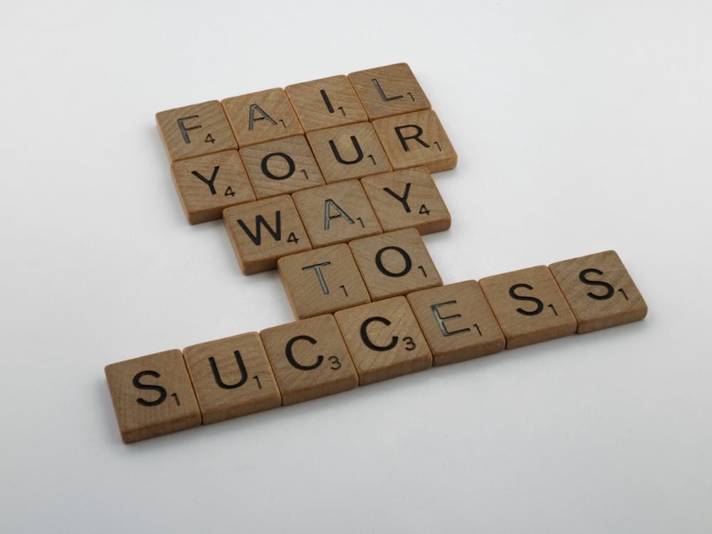‘Fail your way to success’ is written.