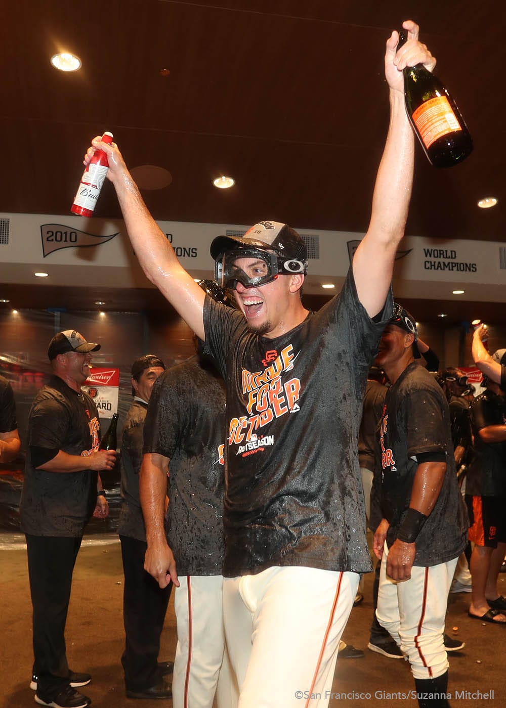 Derek Law celebrates in the clubhouse.