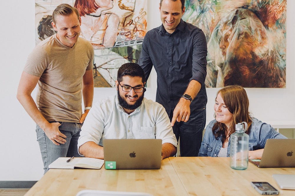 A team of employees working together in an office