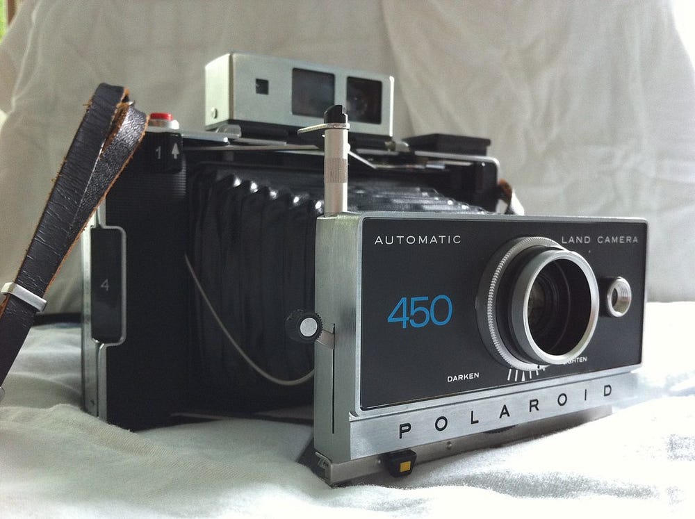 Black Polaroid Land Camera 450 with black bellows.