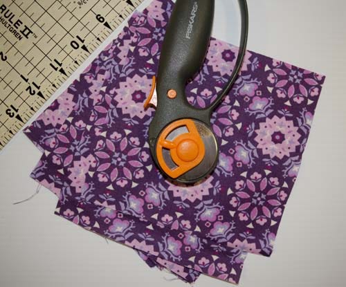 Make a fabulous fabric bow back t-shirt refashion from a plain purple shirt. Step-by-step diy, sewing tutorial. #upcycle #refashionista #crafting #crafts