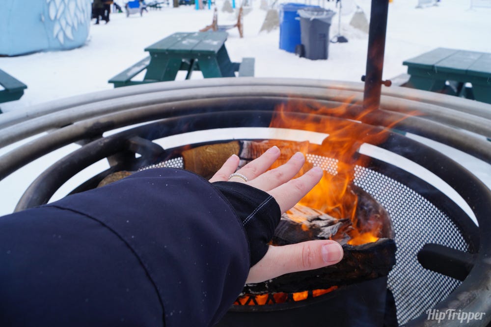 Warming my freezing hands at Quebec Winter Carnival