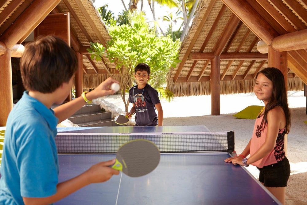  Kids enjoying table tennis 