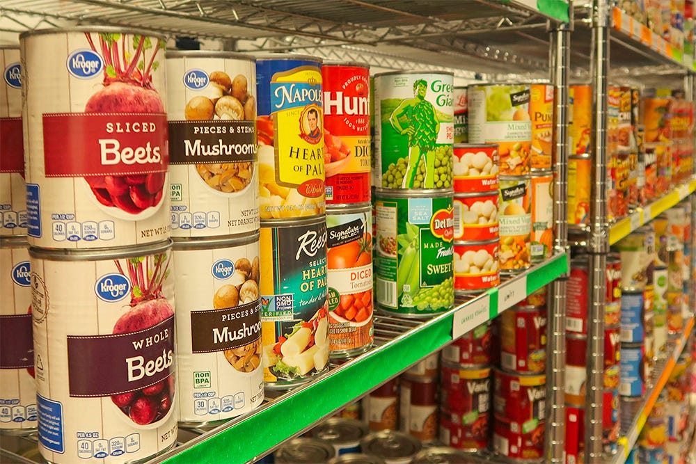 Canned food on shelves.