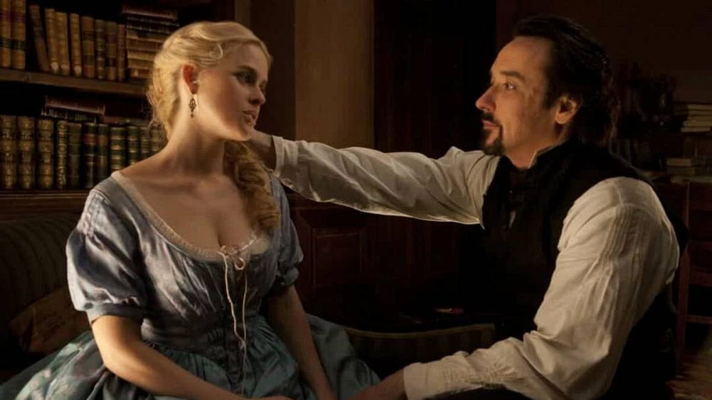 Edgar (Cusack) and Emily (Alice Eve) converse about their future in Poe's library