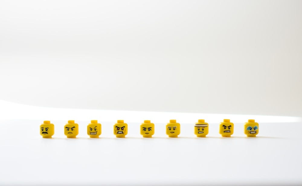 An image of Lego faces displaying various emotions