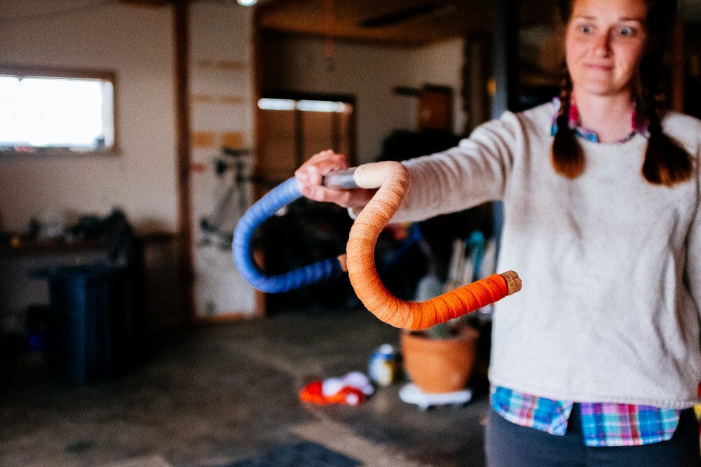 Julia with her custom hand dyed bar tape, a product she abandoned because it was too much work.