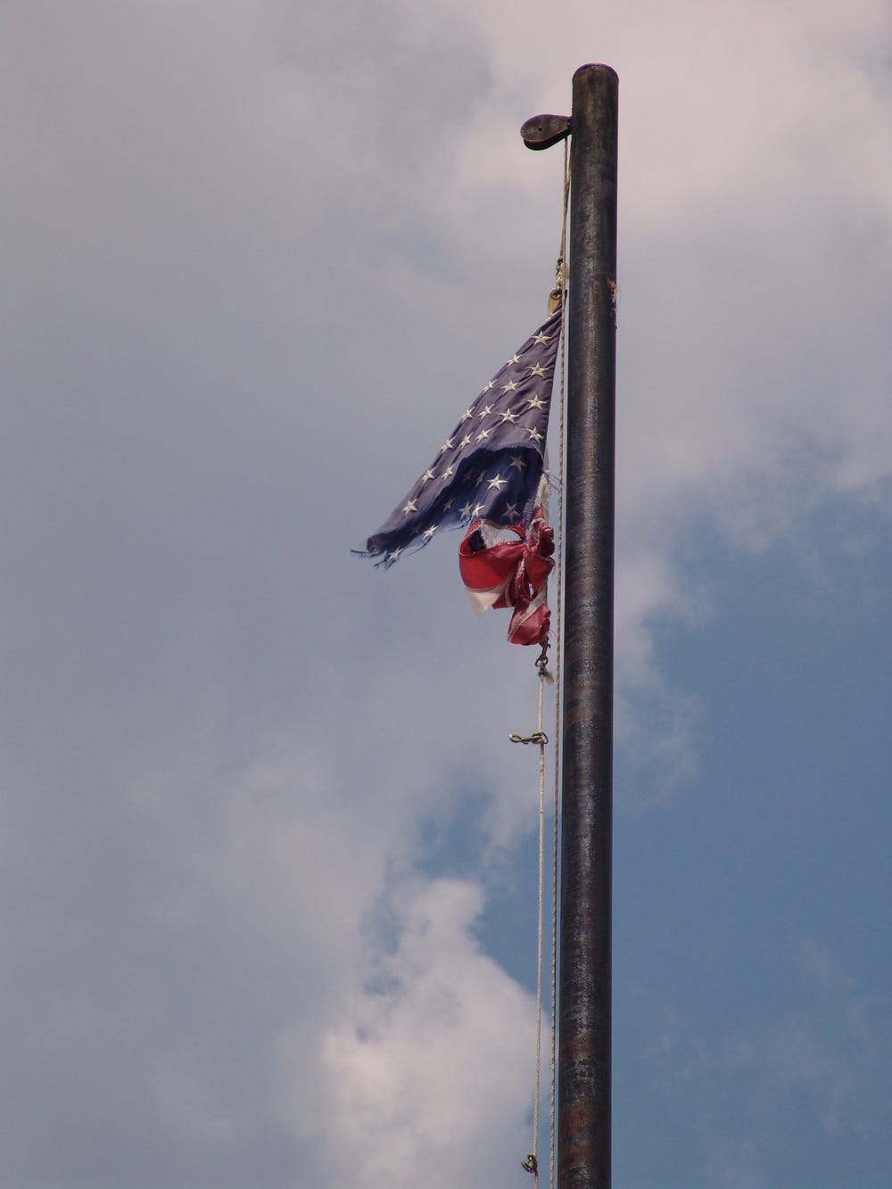 Remnants of an American flag torn by Hurricane Katrina's winds.