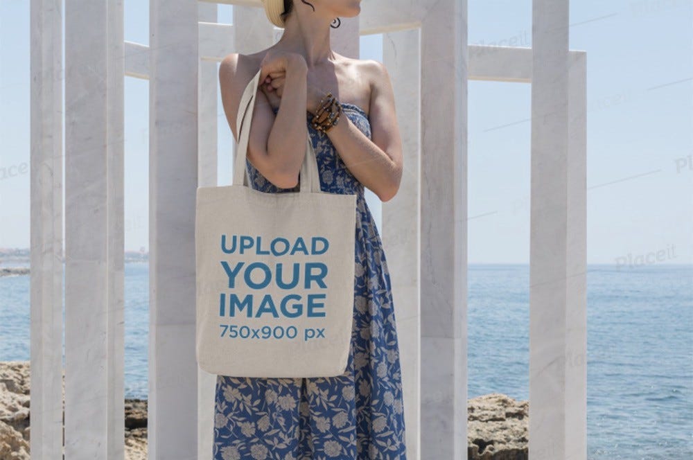 tote bag mockup featuring a woman by the sea