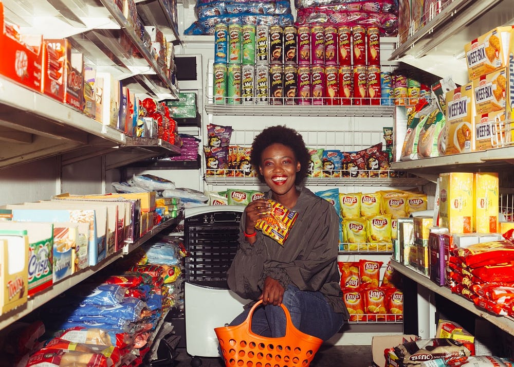 A smiling African businesswoman in her store