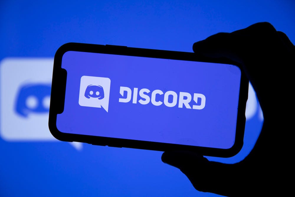 Discord logo on a stylized phone screen