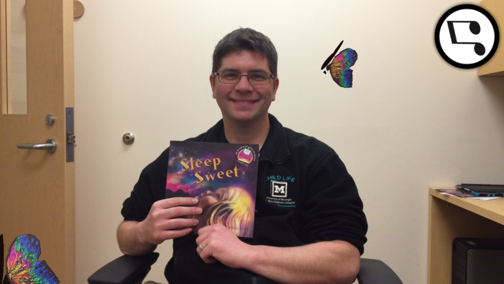JJ Bouchard surrounded by SpellBound's Beyond the Book experience. Those butterflies are everywhere!