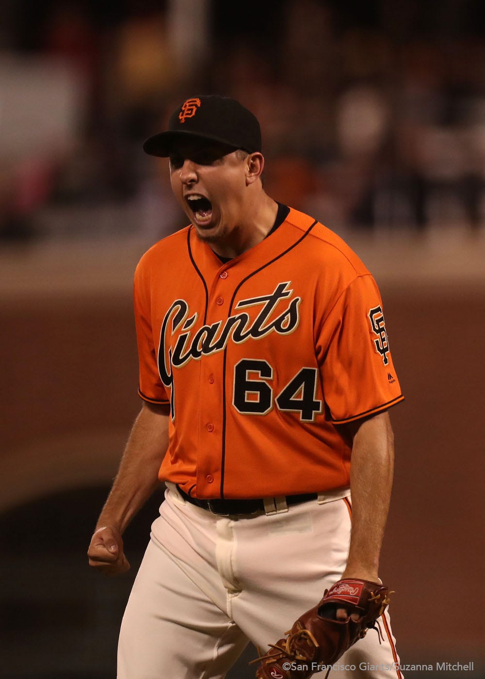 Derek Law reacts after getting the last out of the eighth inning.