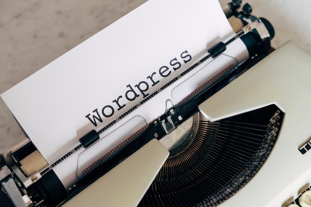 Decorative image of WordPress writing with a typewriter