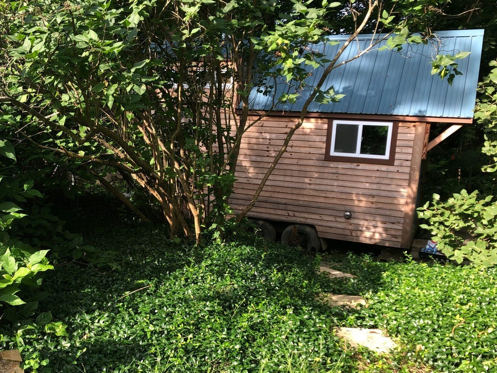 O’Brien hid her tiny house behind trees, but she was still caught.